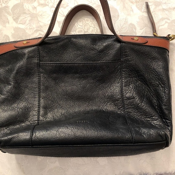 Fossil Handbags - Black with brown trim Fossil purse.